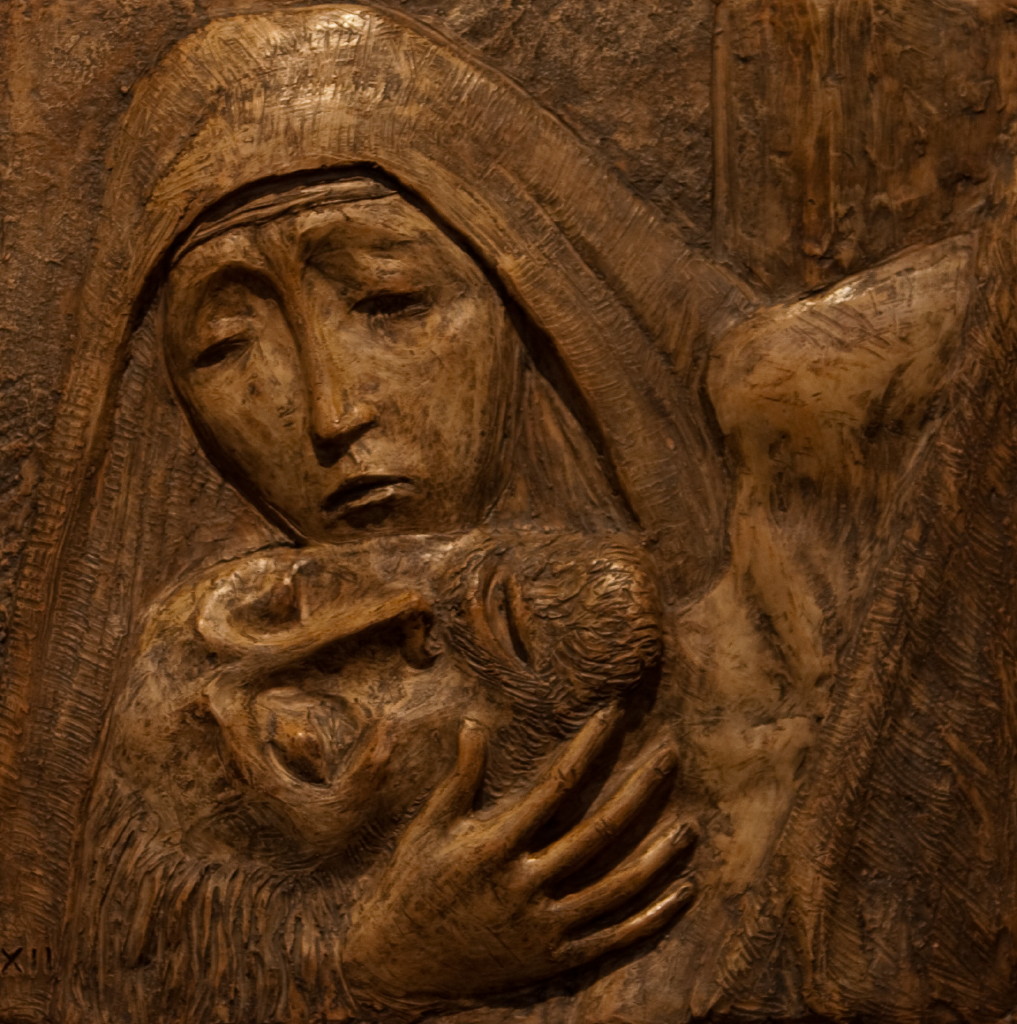 Jesus blir tatt ned av korset og lagt i sin mors fang